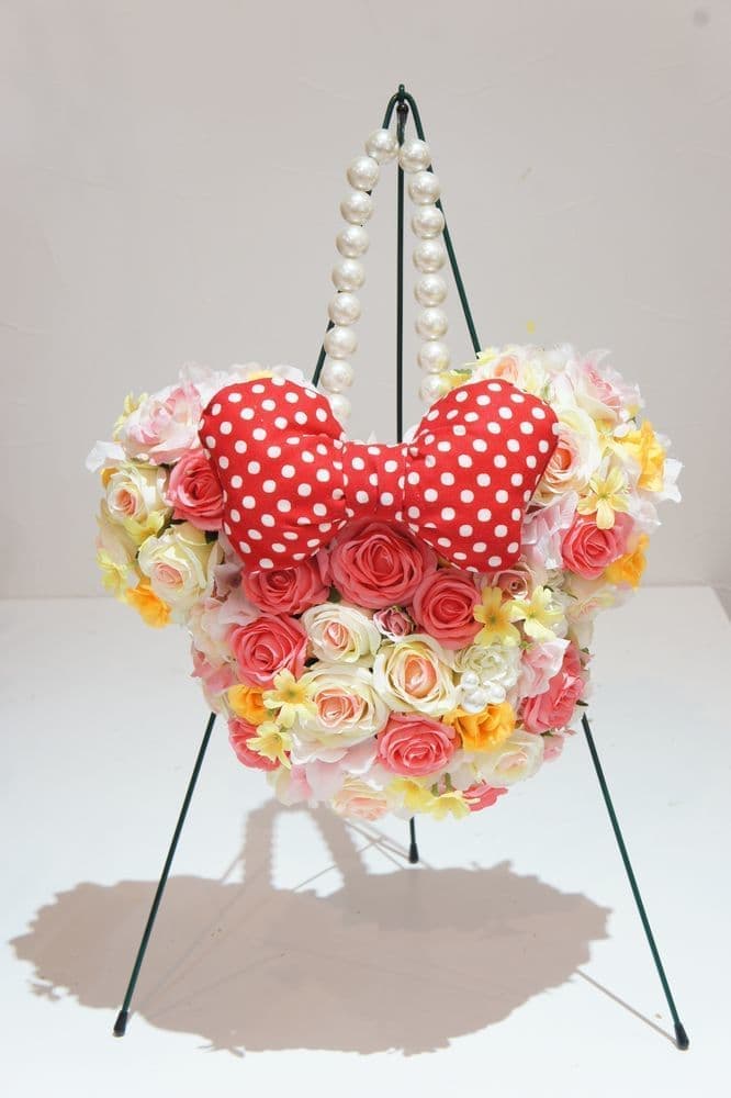 ミニーちゃんのブーケ　高級造花専門店アンクラフトはオーダーメイドでウェディングブーケの制作をしております。お花の事がわからなくても大丈夫。イメージ画像を送っていただければ花嫁様のイメージしているブーケを形にします。相談は無料。国家資格を持つ専門のスタッフが対応いたしますので安心してご相談ください。兵庫県・大阪・関西からのお問合せが沢山。