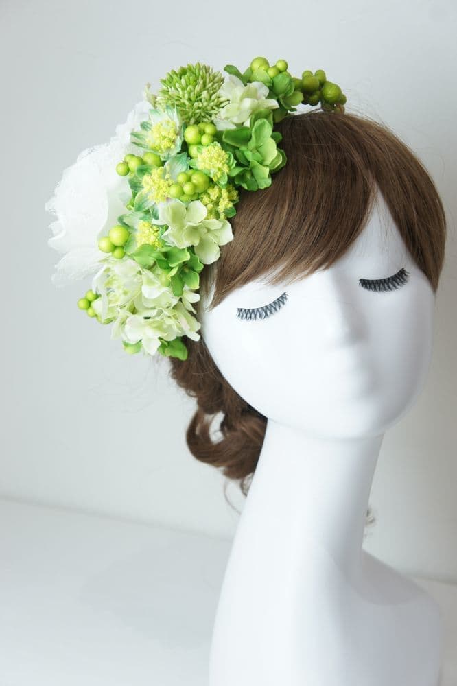 高級造花専門店アンクラフトは１級フラワー装飾技能士がアーティフィシャルフラワー（造花）を使用し、ご希望のアレンジメント、髪飾り、ブーケをオーダーメイドで制作致します。結婚記念日やお見舞いの花、花言葉に合わせたお花の贈り物や開店花、待合室用、応接用花、個性的な髪飾りや派手な花、大人可愛い、おしゃれなバラなどどんなオーダーでもお気軽にお問い合わせください。大阪、兵庫県、関西からアクセスが簡単。