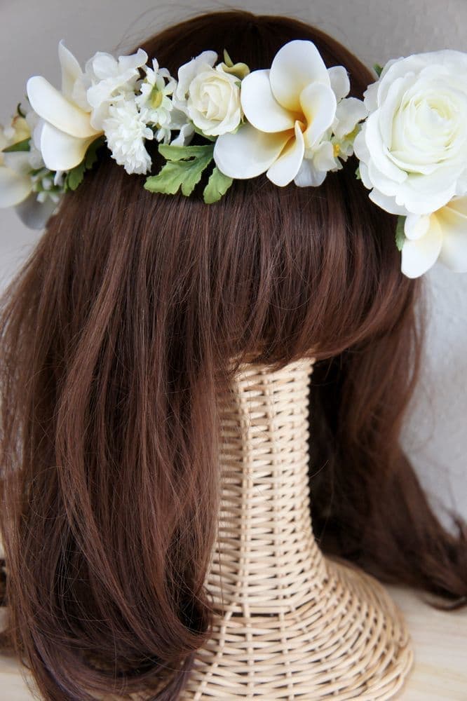 プルメリアの花冠　花冠　可愛い　個性的　高級造花専門店アンクラフトはアーティフィシャルフラワー（高級造花）専門店です。生花のような繊細なお花なのに枯れずにお手入れ不要なところが人気になっています。オーダーメイドの髪飾りを承っております。成人式用・結婚式用・披露宴・パーティ用・七五三御祝い等ご用意しております。　国家資格1級　大阪　関西　兵庫県